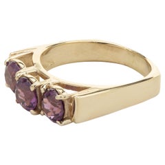 Anello con granato d'uva in oro giallo 14 carati
