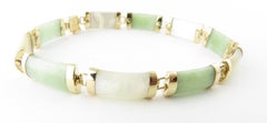 14 Karat Yellow Gold Green and White Jade Bracelet