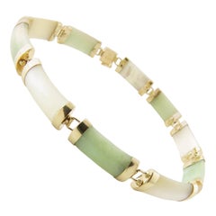 14 Karat Yellow Gold Green and White Jade Bracelet