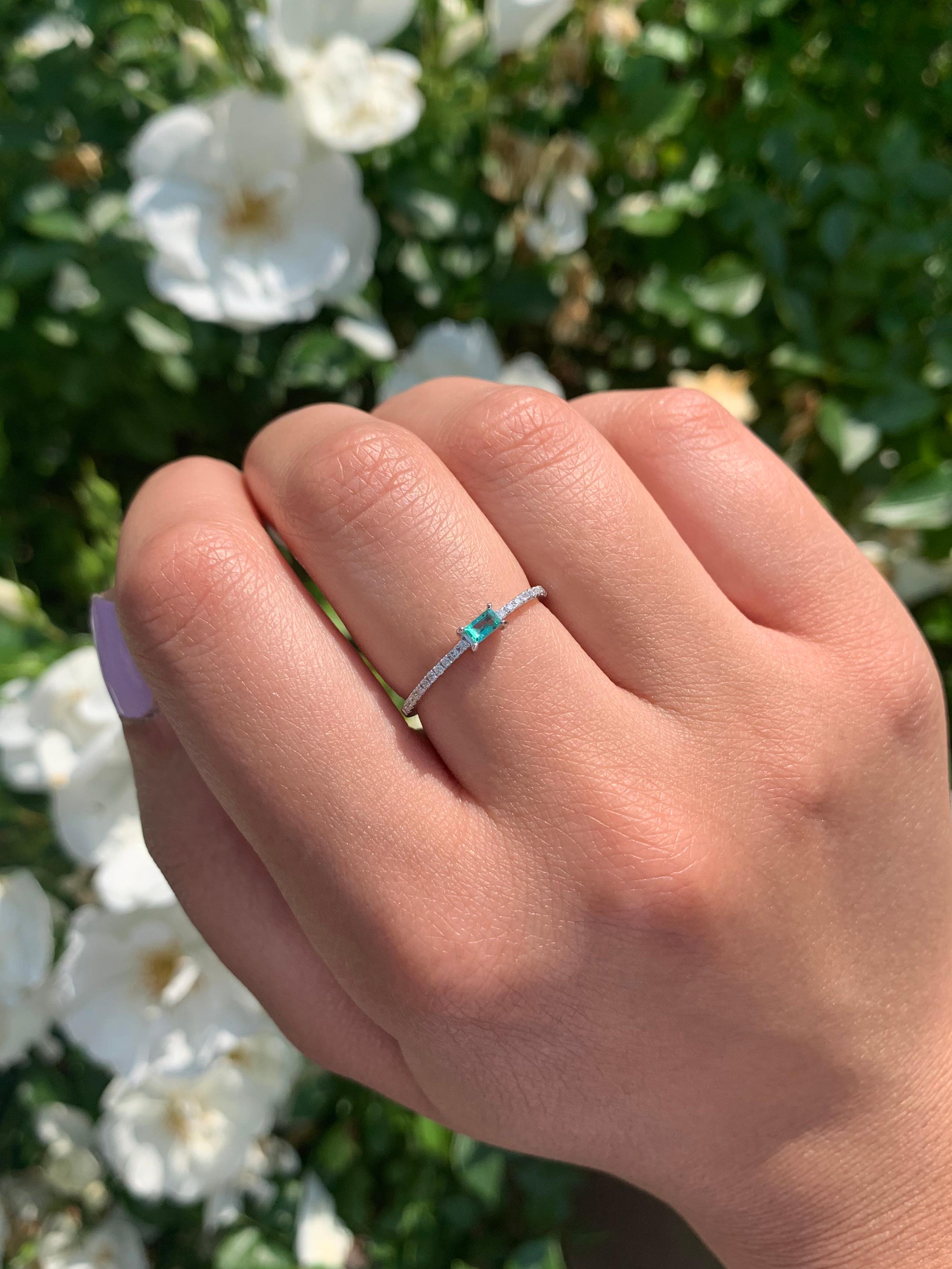 Charming and Elusive Design - This stackable ring features a 14k gold band, a baguette shaped gorgeous emerald approximately 0.10cts, and round diamonds approximately 0.09 cts, available in white or yellow gold
Measurements for ring size: The finger