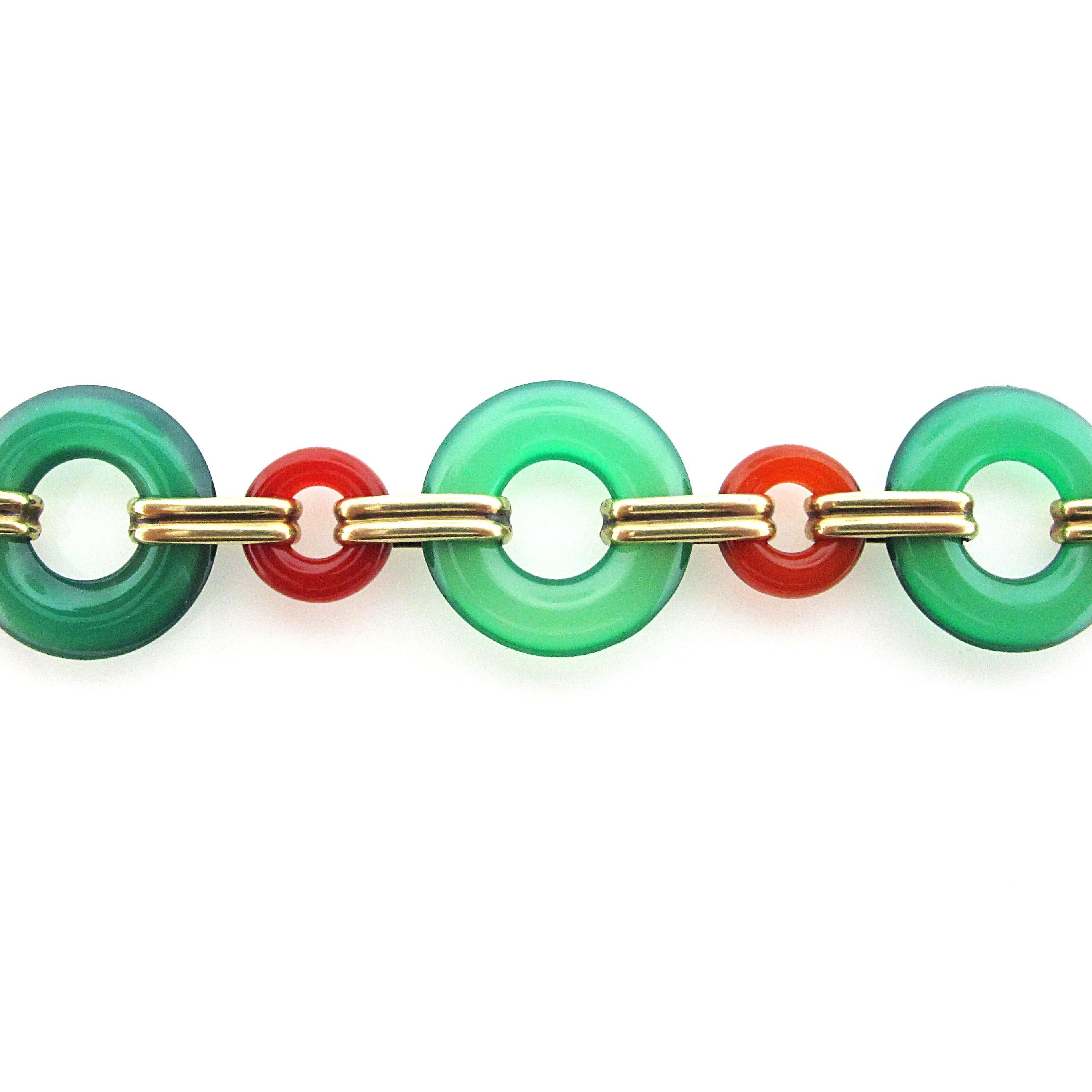 Fashion forward, retro link green onyx bracelet. The bracelet has great movement and is very comfortable to wear. The links are held together by 14 karat yellow gold.
The bracelet is 7 inches in length