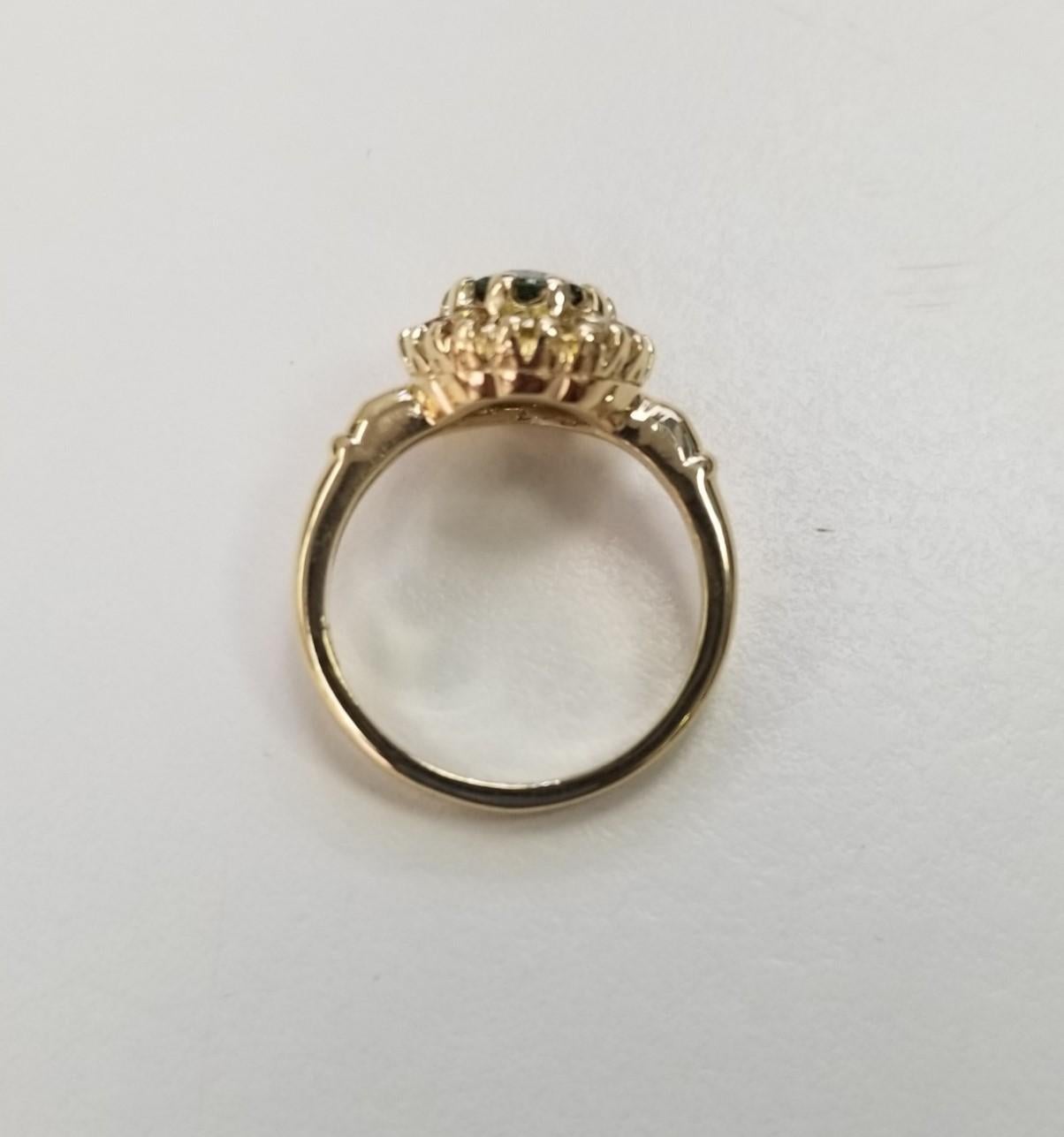 Oval Cut 14 Karat Yellow Gold Green Sapphire yellow Diamond Halo Ring For Sale