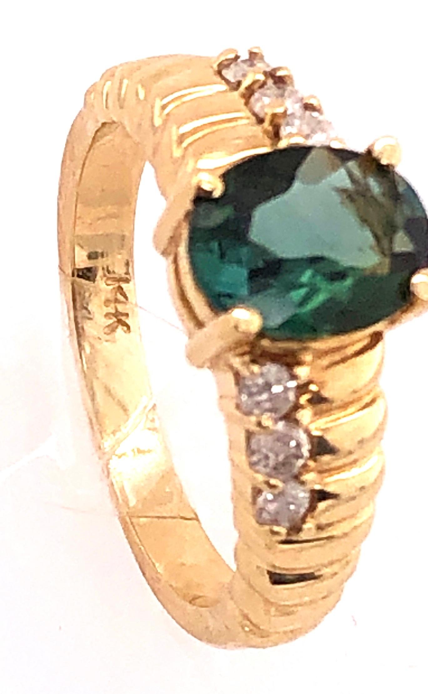 Modern 14 Karat Yellow Gold Green Topaz Solitaire Ring with Diamond Accents 0.30 TDW