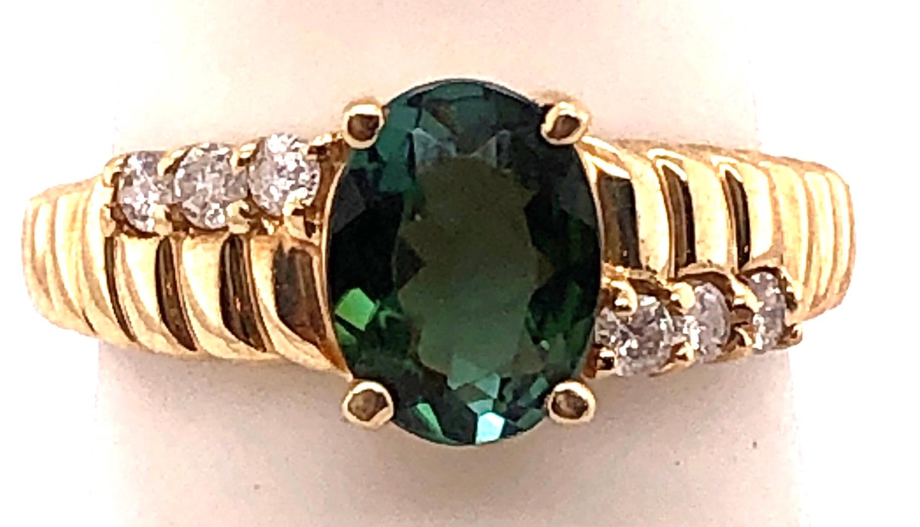 14 Karat Yellow Gold Green Topaz Solitaire Ring with Diamond Accents 0.30 TDW 1