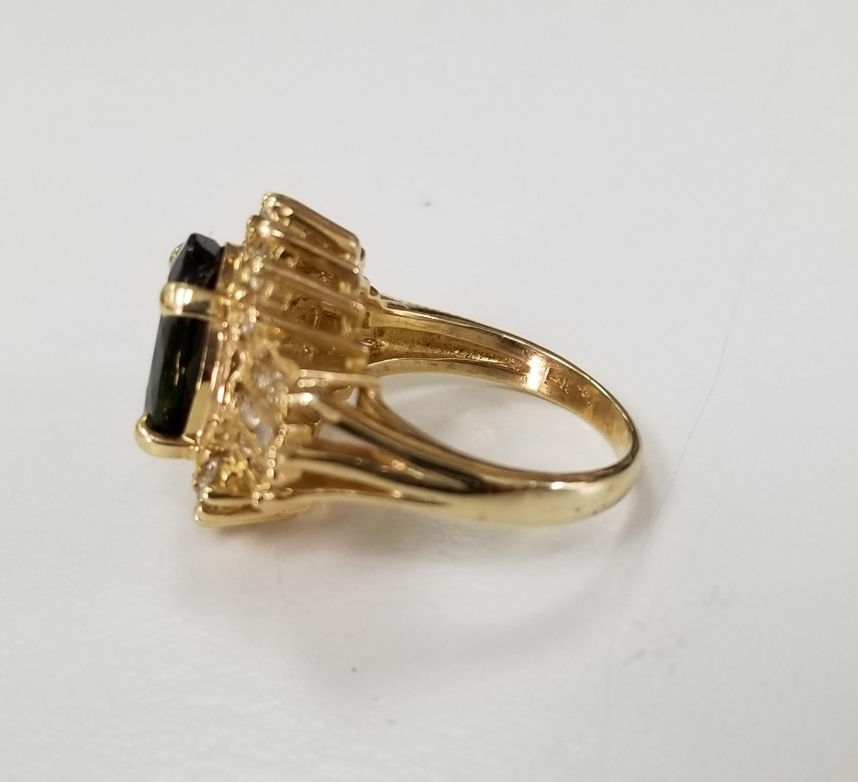 Contemporary 14 Karat Yellow Gold Green Tourmaline and Diamond Ring For Sale