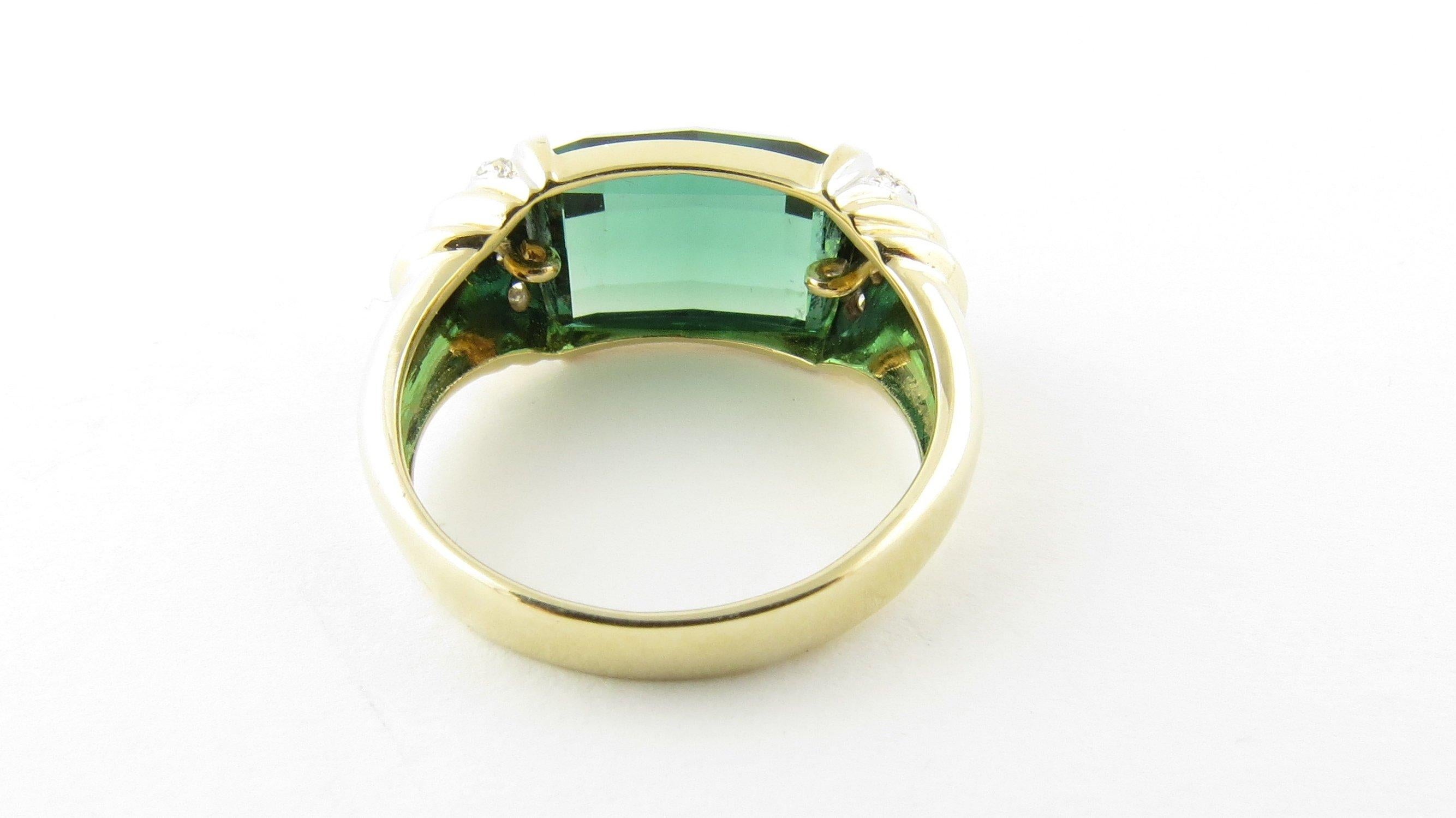 Vintage 14 Karat Yellow Gold Green Tourmaline Ring Size 6.75- This elegant ring features one green tourmaline (9 mm x 13 mm) set in classic 14K yellow gold. Width: 9 mm. Shank measures 3 mm. Ring Size: 6.75 Weight: 3.4 dwt. / 5.3 gr. Hallmark: KM