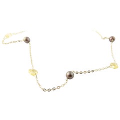 Collier en or jaune 14 carats, perles grises et citrine