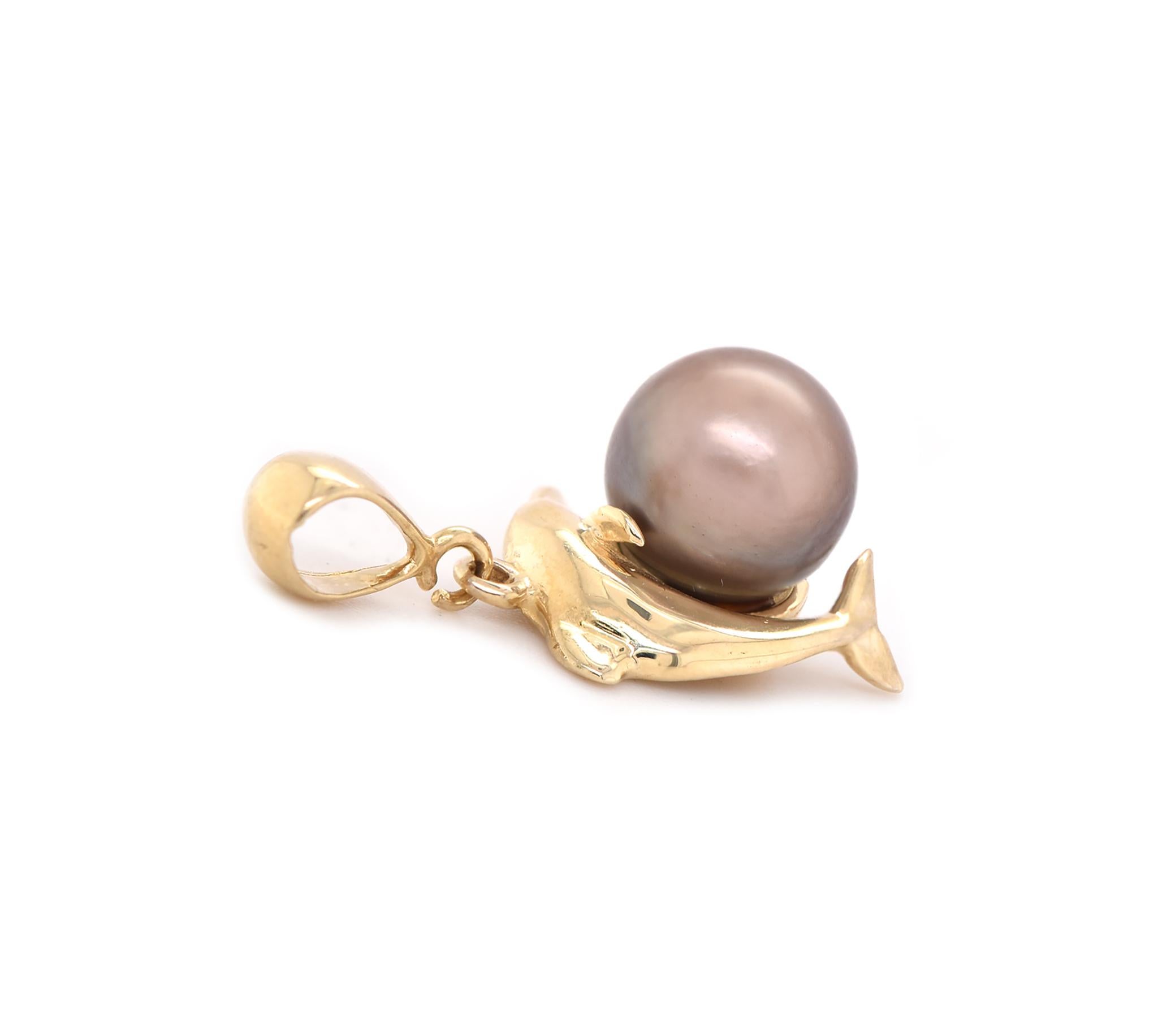 Designer: custom 
Material: 14K yellow gold
Pearl: 1 grey pearl = 9.4mm
Dimensions: pendant measures 25 X12mm
Weight: 3.75 grams
