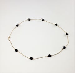 14 Karat Yellow Gold Grey Pearl Necklace