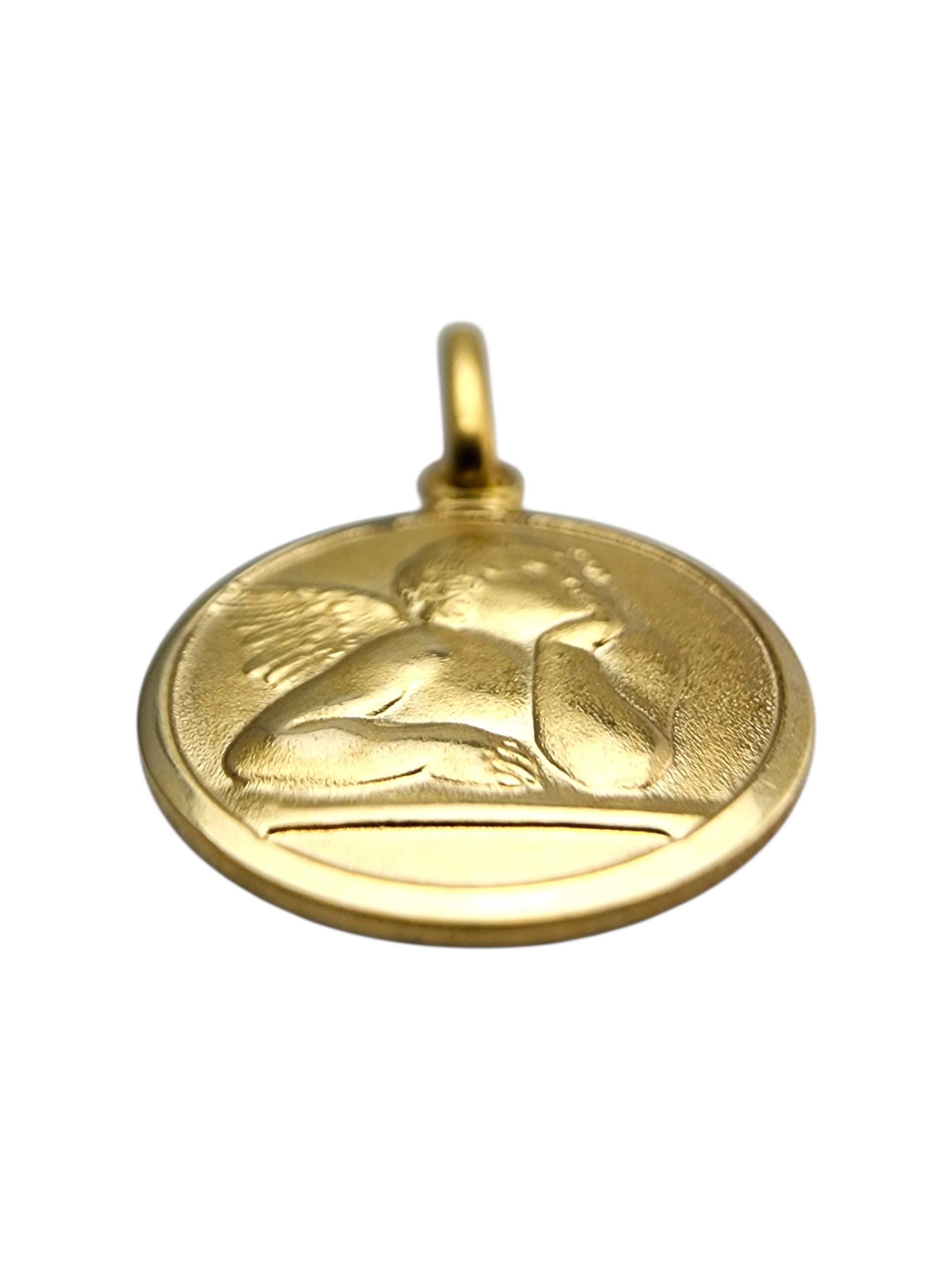 Charm Angelo Custode in oro giallo 14 carati.

Questo charme di angelo custode in oro giallo 14 carati presenta un disegno ben dettagliato che simboleggia protezione, guida e fede. La sua finitura lucida gli conferisce una luce radiosa, rendendolo