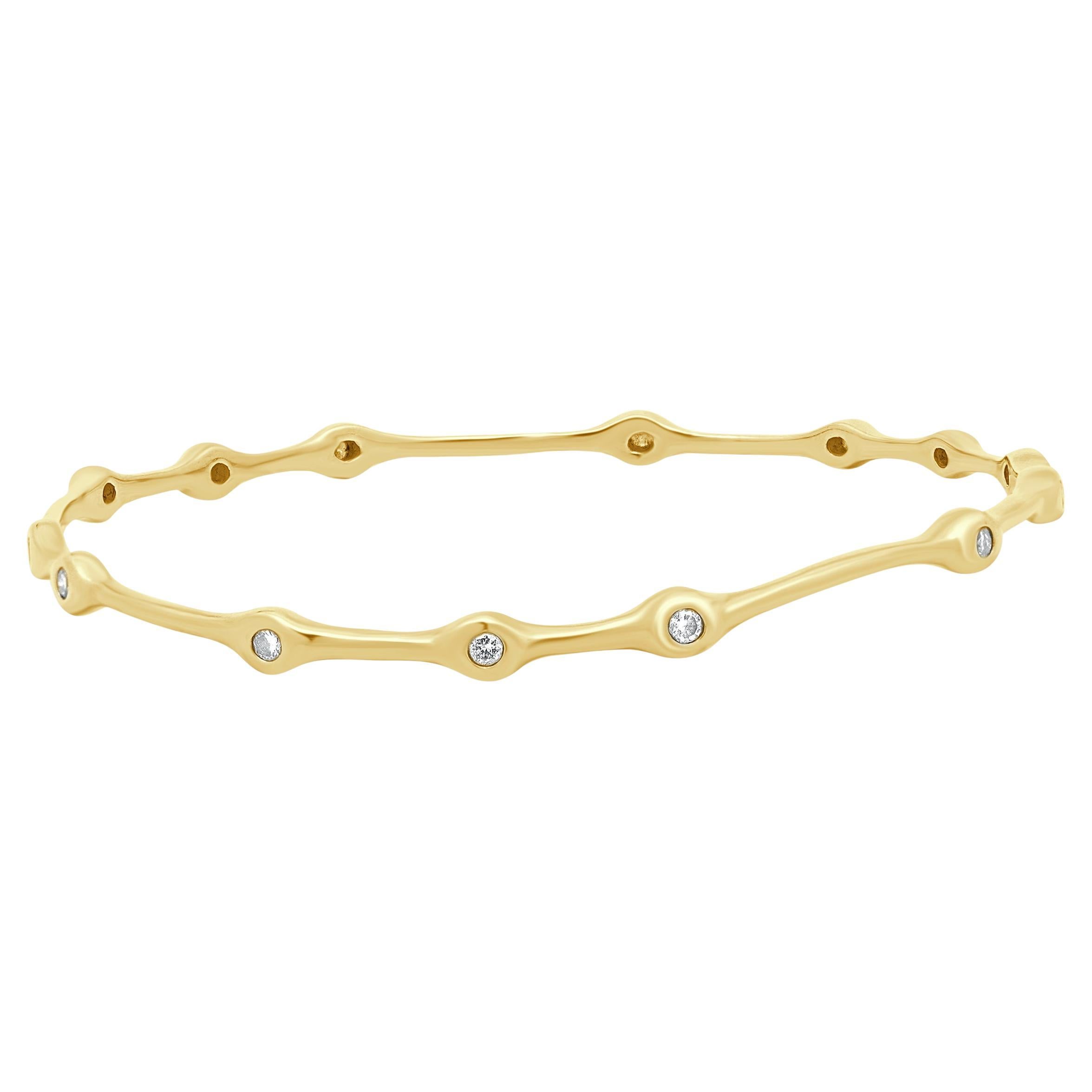 Bracciale smerlato in oro giallo 14 carati con diamanti incastonati in vendita