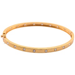 14 Karat Yellow Gold Hammer Diamond Bangle Bracelet