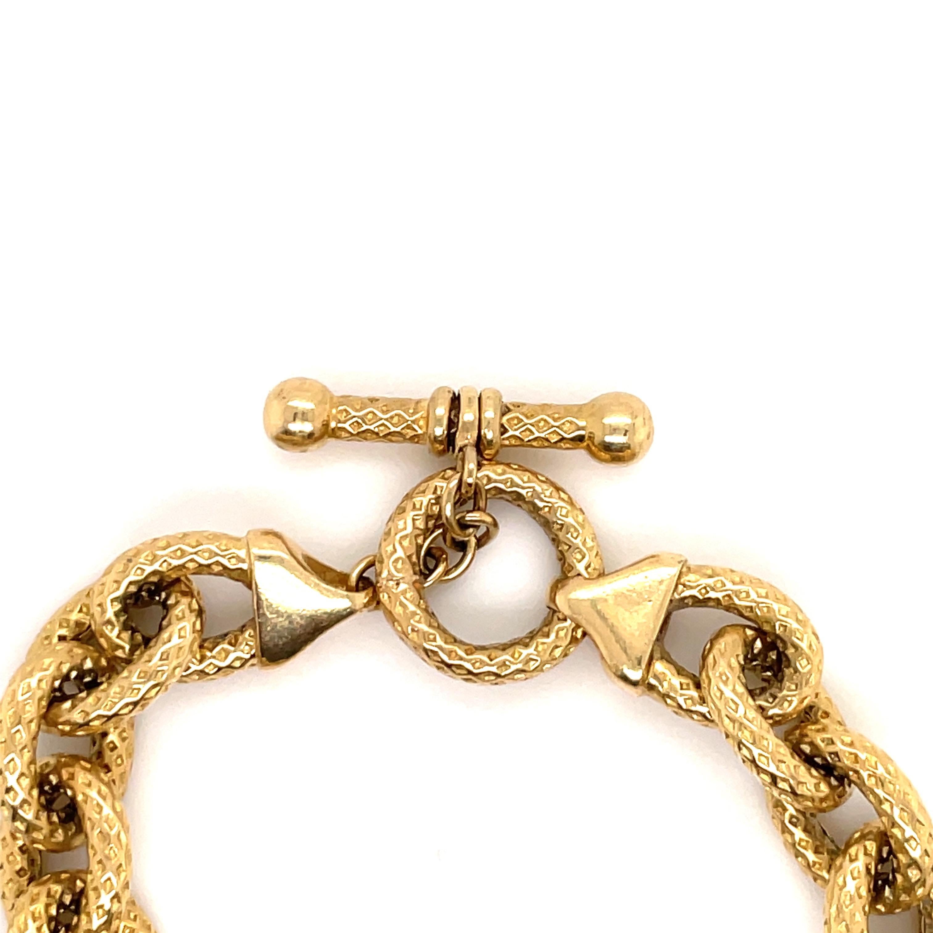 14 Karat Yellow Gold bracelet featuring 19 oval hammered links weighing 17.3 grams. Made In Italy.
Great for stacking!
More Link Bracelets Available.