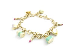 14 Karat Yellow Gold Handbag and Lipstick Charm Bracelet