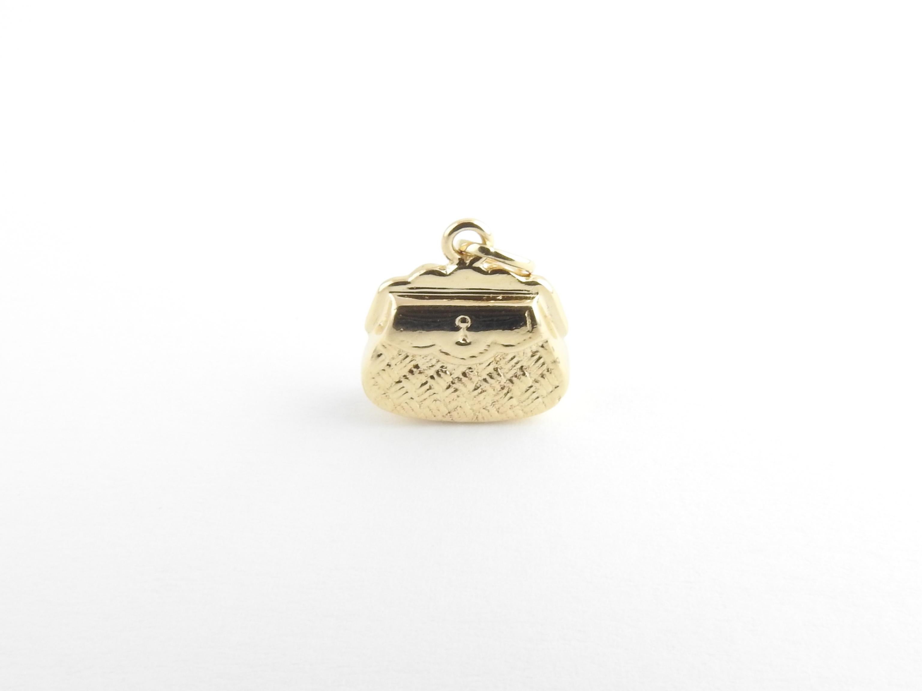 Vintage 14 Karat Yellow Gold Handbag Charm

Perfect for the fashionista!

This lovely 3D charm features a miniature handbag meticulously detailed in 14K yellow gold.

Size: 15 mm x 15 mm (actual charm)

Weight: 5.1 dwt. / 8.0 gr.

Acid tested for