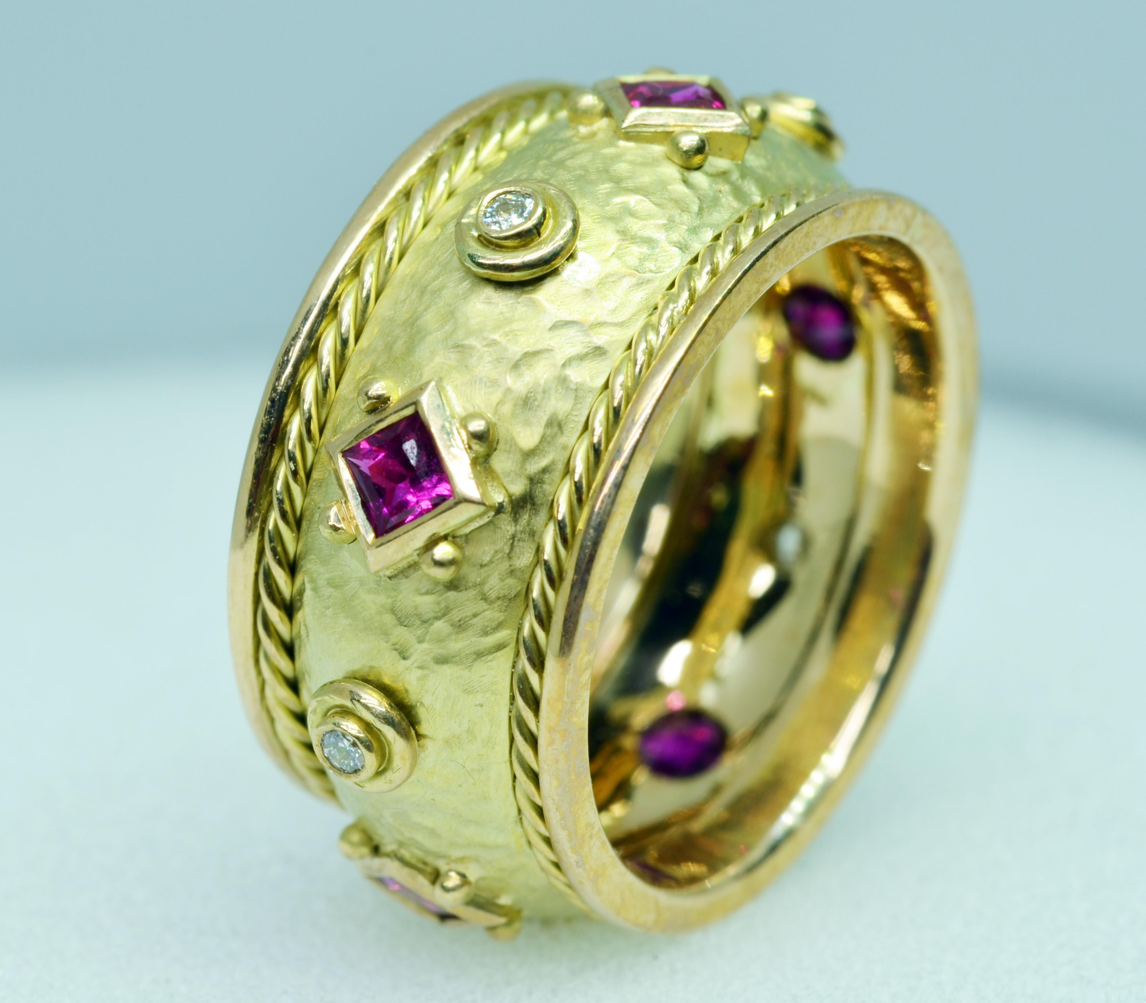 14 Karat Yellow Gold Handmade Ruby and Diamond Cigar Band.
This ring is handcrafted in 14Karat Yellow old and set with five Princess cut Rubies and five small Diamonds. The background is textured somewhat like leather. This ring can be custom made