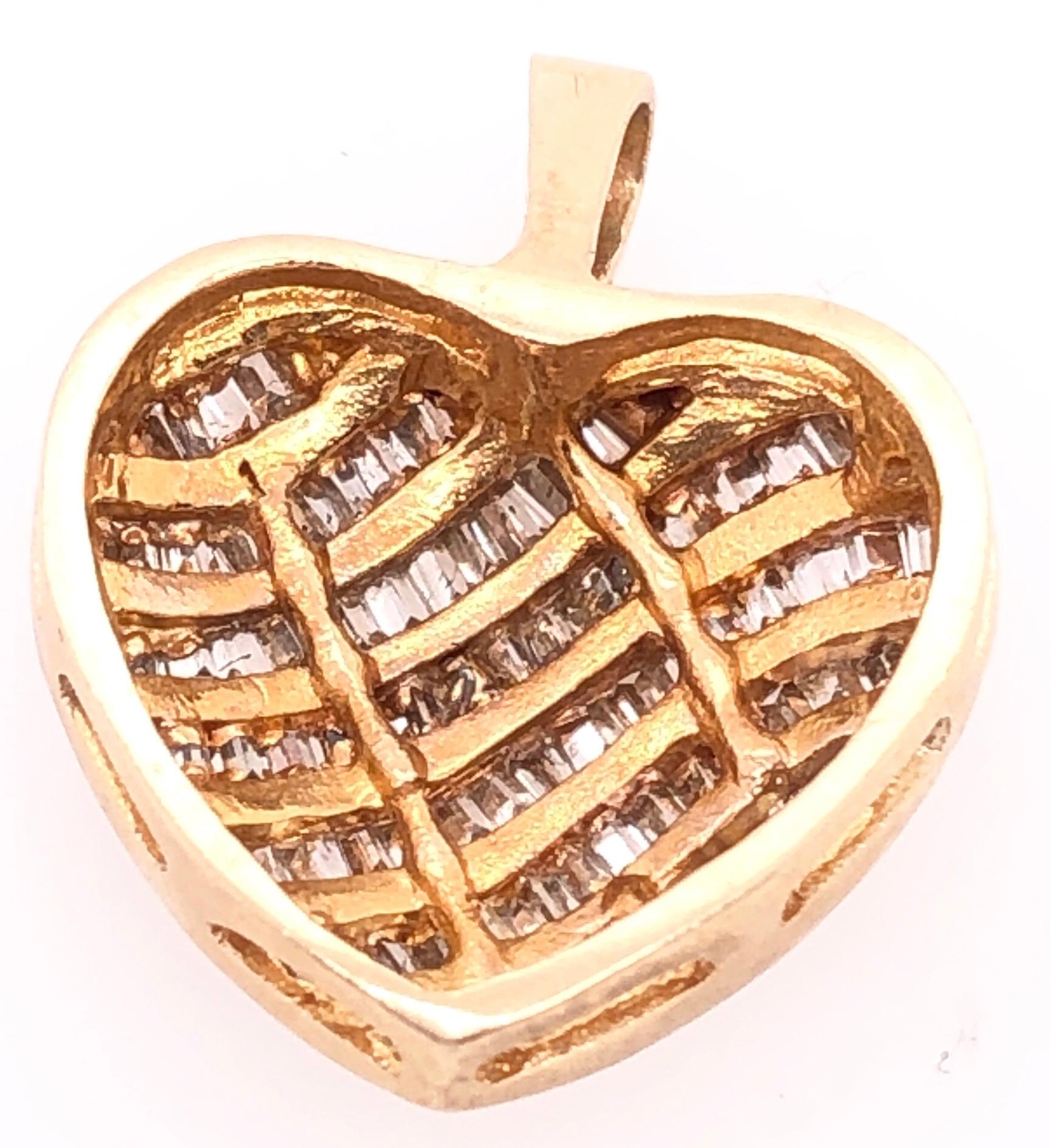 breloque/pendentif en or jaune 14 carats en forme de cœur avec diamants.
3.poids total de 3 grammes.