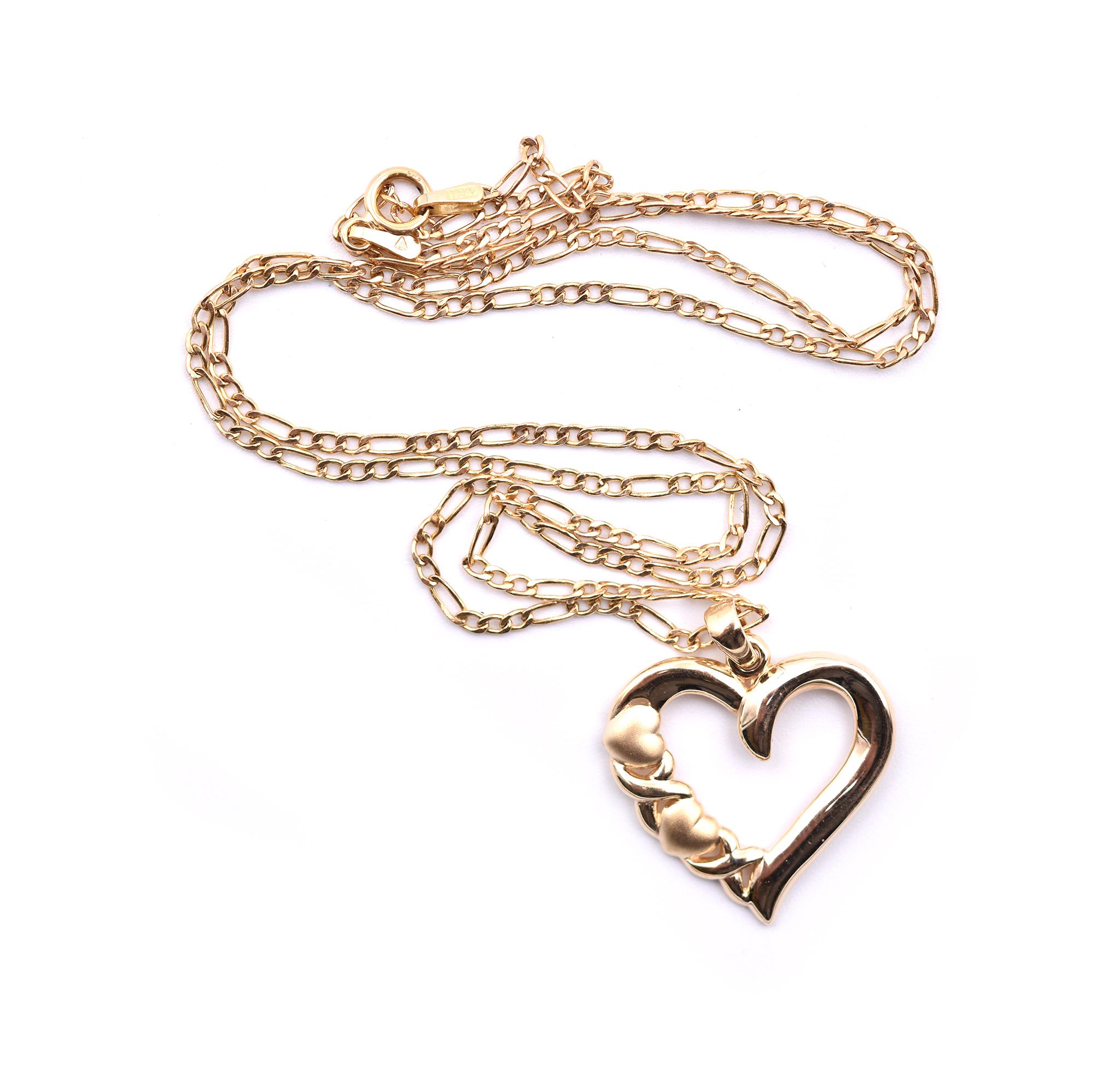 Designer: custom 
Material: 14K yellow gold
Dimensions: the necklace measures 18-inches in length
Weight:  3.06 grams