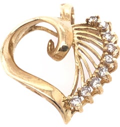14 Karat Yellow Gold Heart Pendant with Diamond Accents
