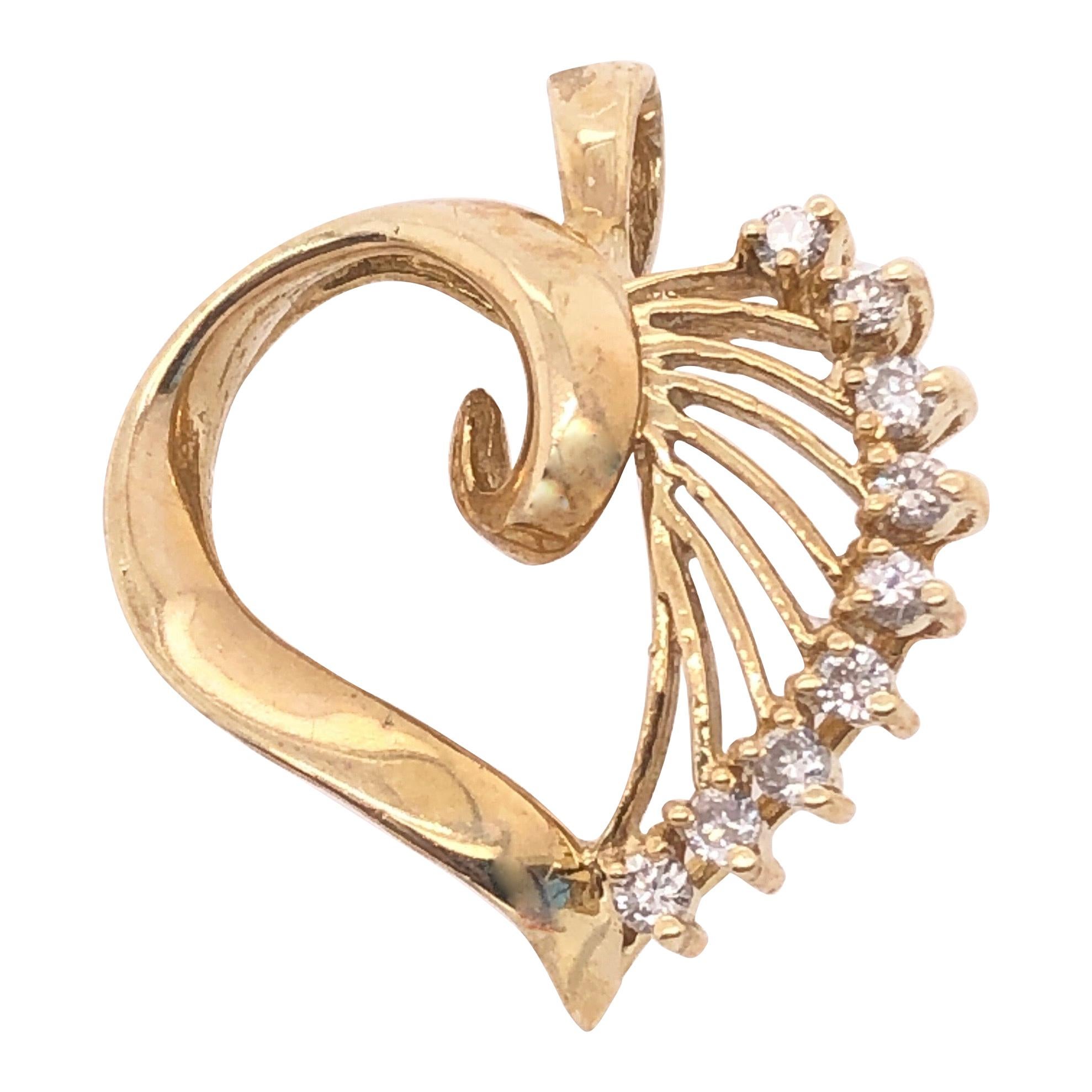 14 Karat Yellow Gold Heart Pendant with Diamond Accents For Sale