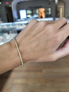 14 Karat Yellow Gold Heart Shaped Diamond Bangle