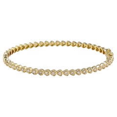 Bracelet jonc en or jaune 14 carats avec diamants en forme de cœur