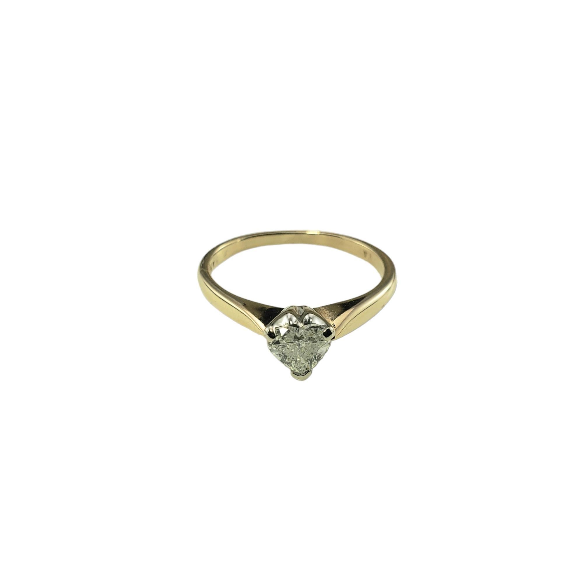 14 Karat Yellow Gold Heart Shaped Diamond Engagement Ring #15689-

This sparkling engagement ring features one heart shaped diamond (6 mm x 6 mm) set in classic 14K yellow gold. Shank: 1.5 mm.

Approximate total diamond weight:   .45 ct.

Diamond
