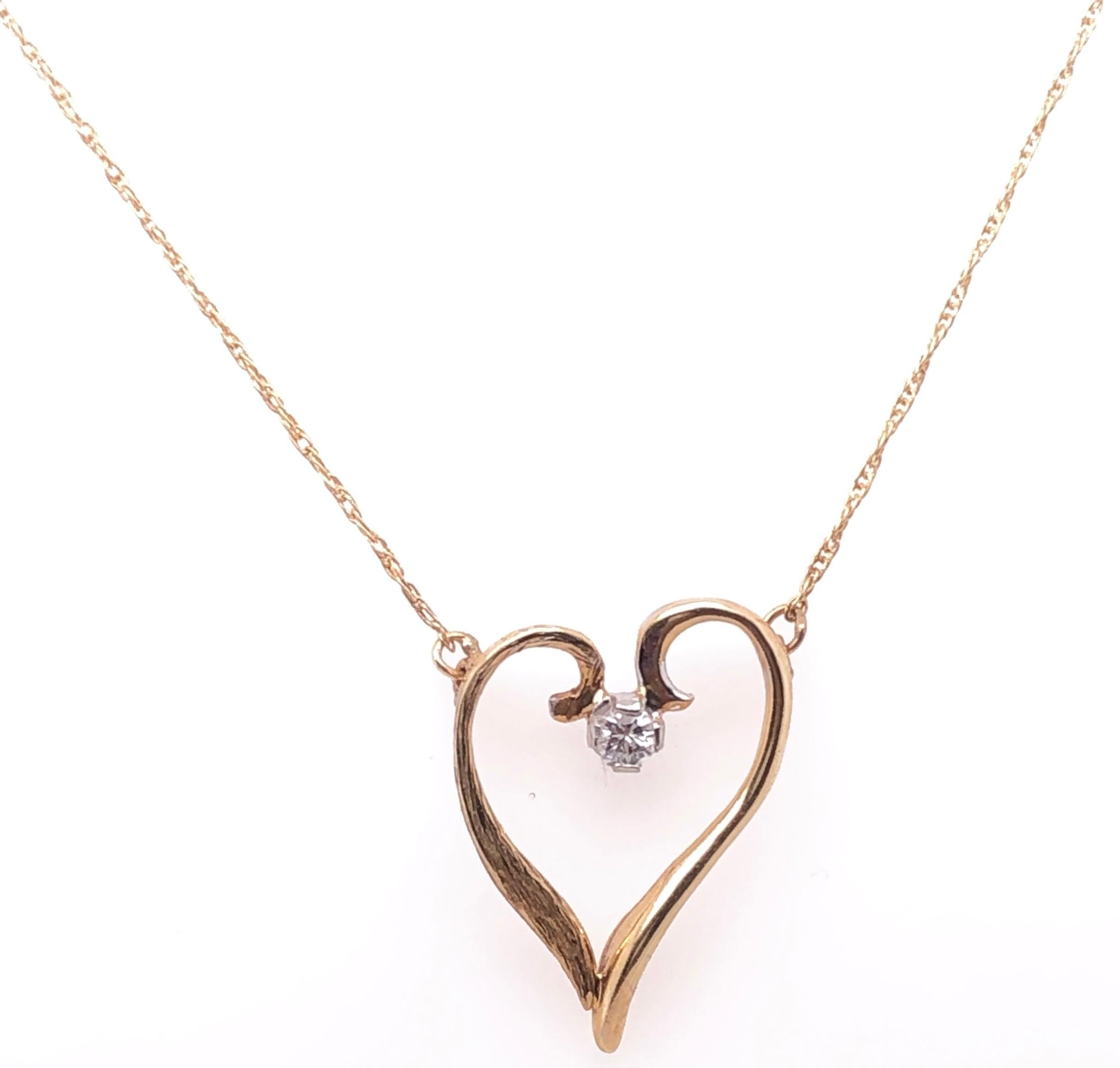 Collier pendentif cœur soudé en or jaune 14 carats avec diamants au centre en vente 1