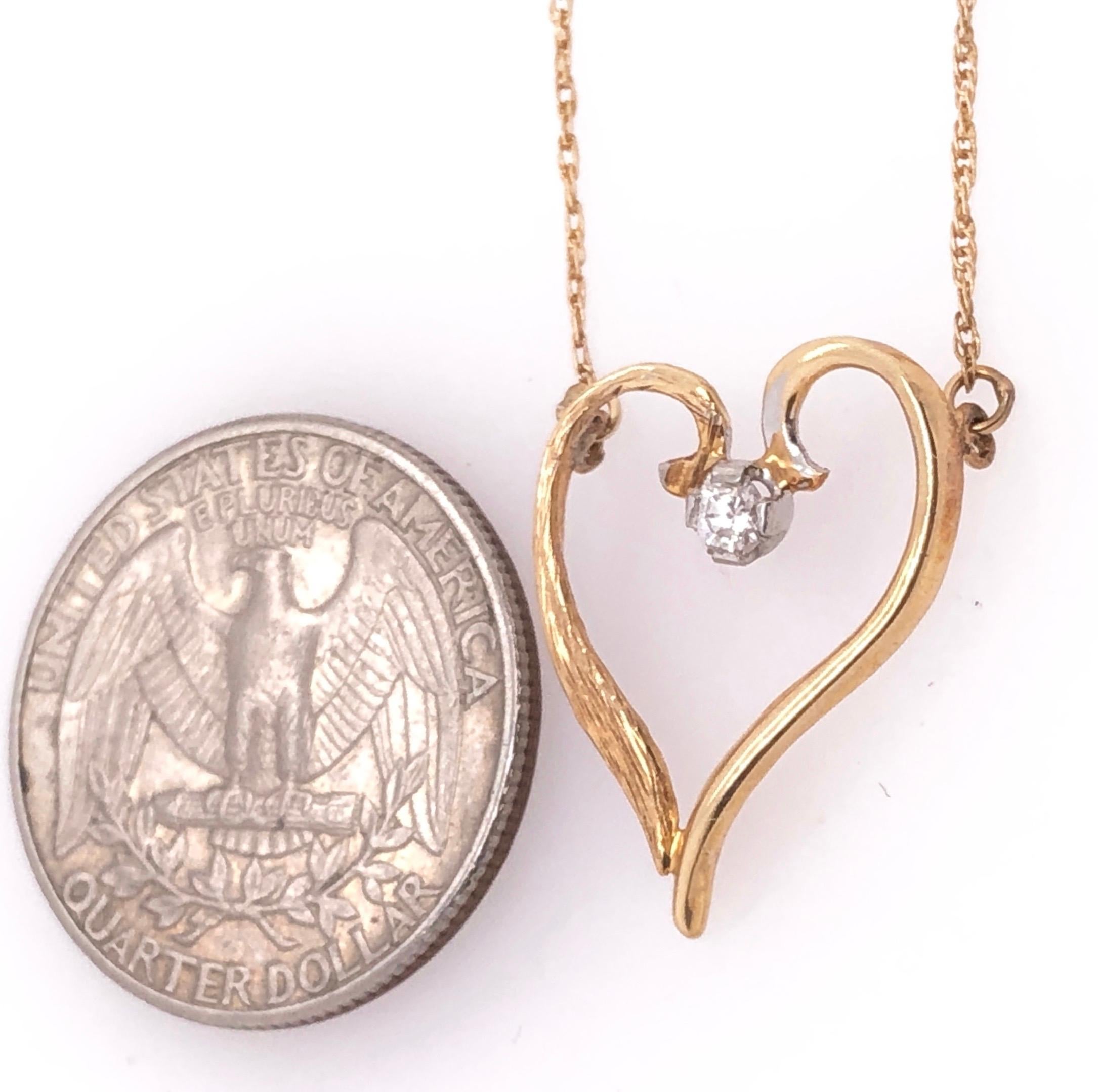 Collier pendentif cœur soudé en or jaune 14 carats avec diamants au centre en vente 2