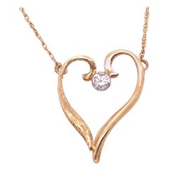 14 Karat Yellow Gold Heart Soldered Pendant with Center Diamond Necklace