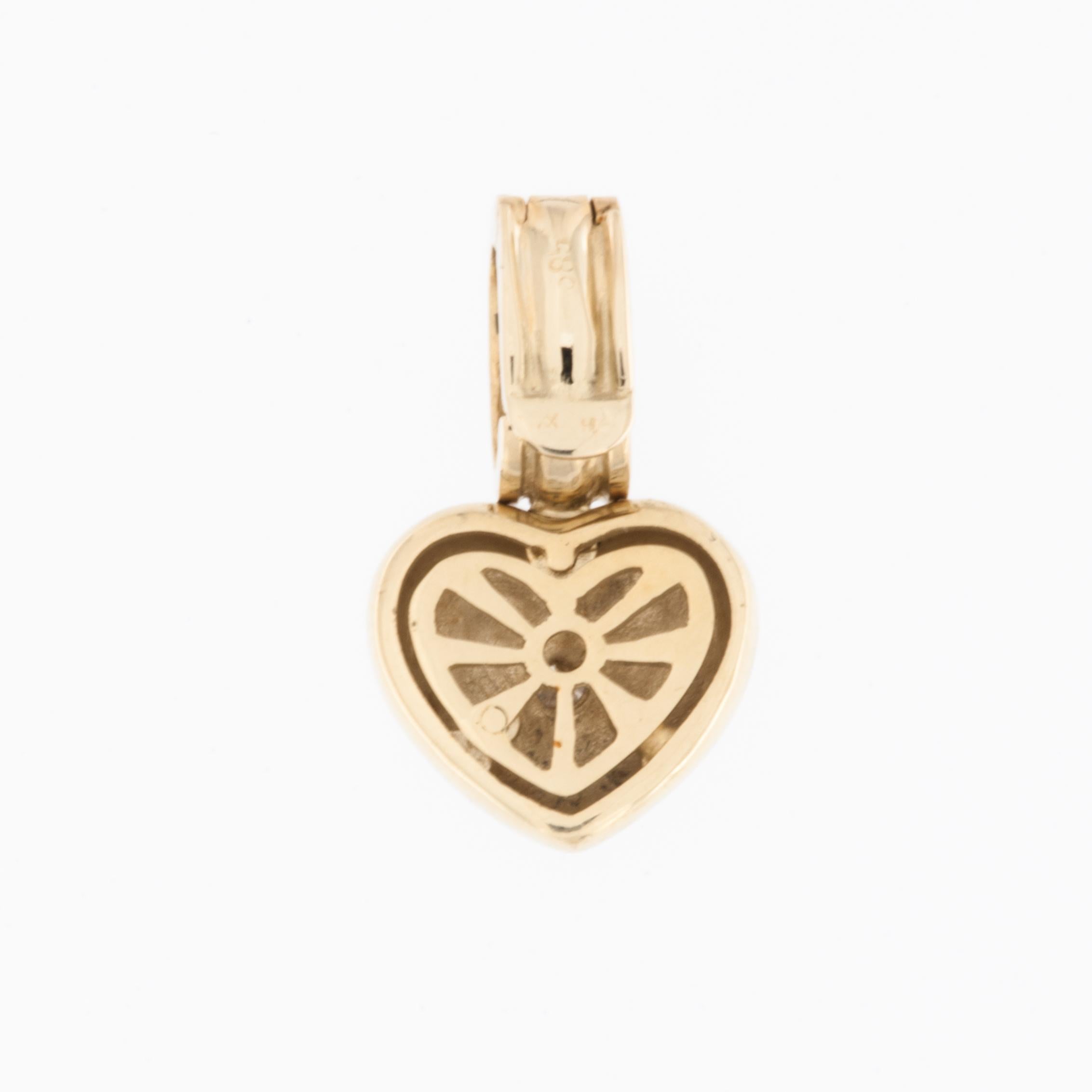 Modern 14 karat Yellow Gold Heart with Diamond For Sale