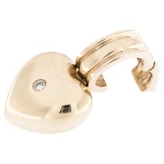 Cuore in oro giallo 14 carati con diamante