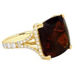 Anillo de oro amarillo de 14 quilates con granate grossular de hessonita y diamantes