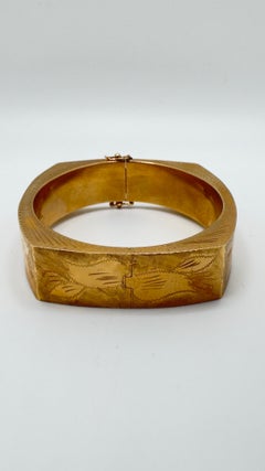 14 Karat Yellow Gold Hollow Bangle with Diamond Cut Detailing, 27.0 Grams