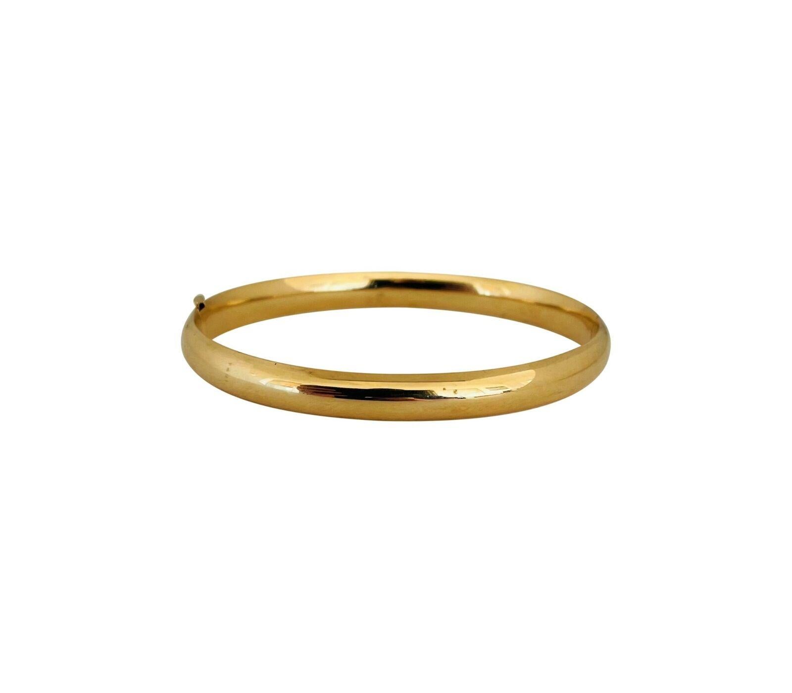 14 Karat Yellow Gold Hollow Ladies Polished Bangle Bracelet 1
