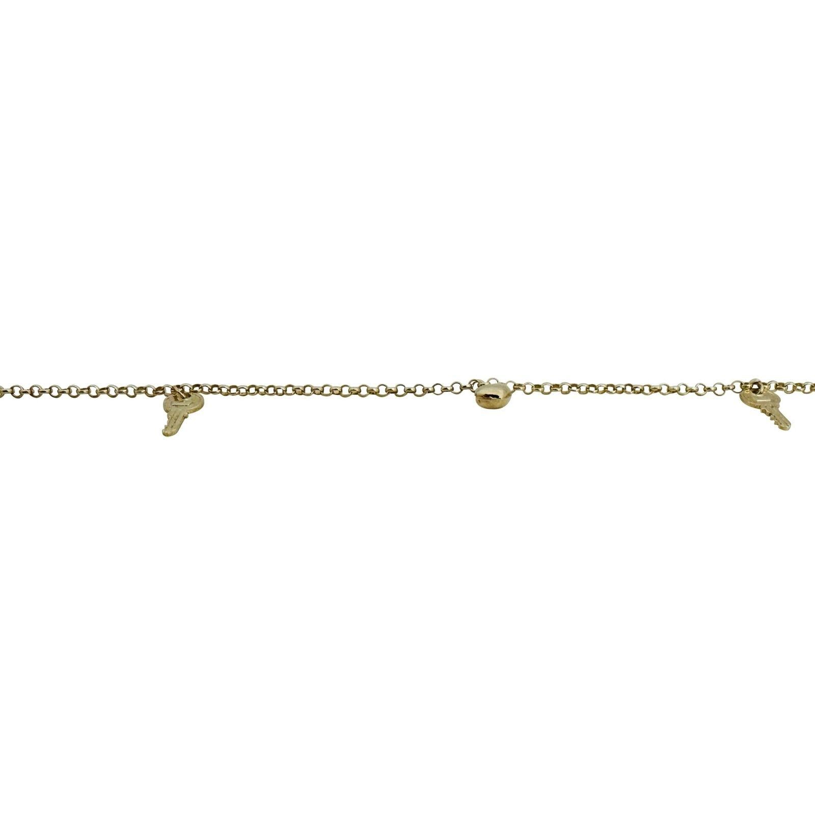 14 Karat Gelbgold Hohllicht-Schlüssel und Herz-Charm-Kabel-Gliederarmband im Zustand „Gut“ in Guilford, CT