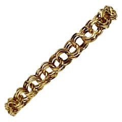 14 Karat Yellow Gold Hollow Triple Circle Link Charm Bracelet