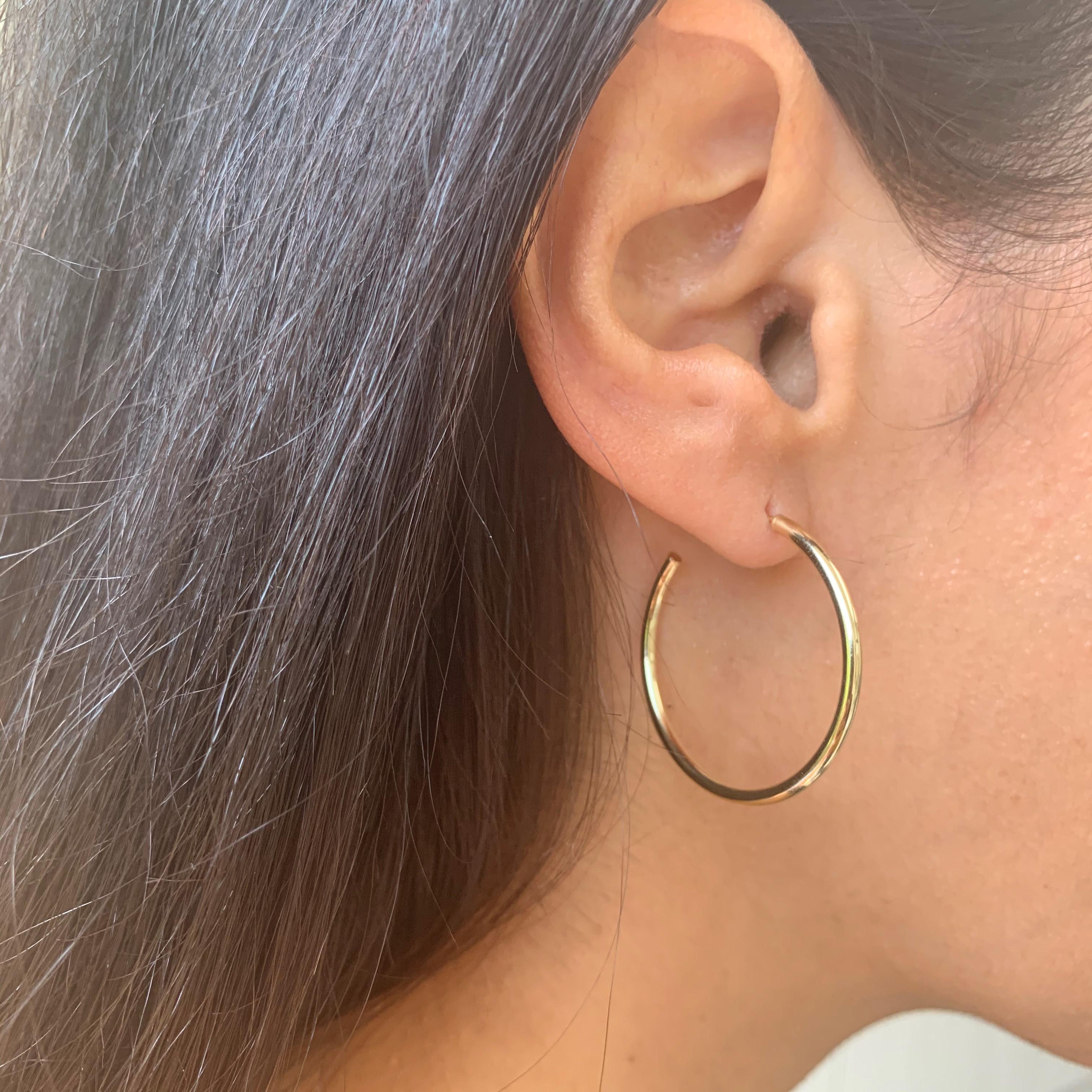 These Elegant and Stylish 14K Yellow Gold Hoop Earrings will add that perfect Glam to your look! 
Earring Measurements are 2 X 30 MM. 
Made in Italy. 
1.2