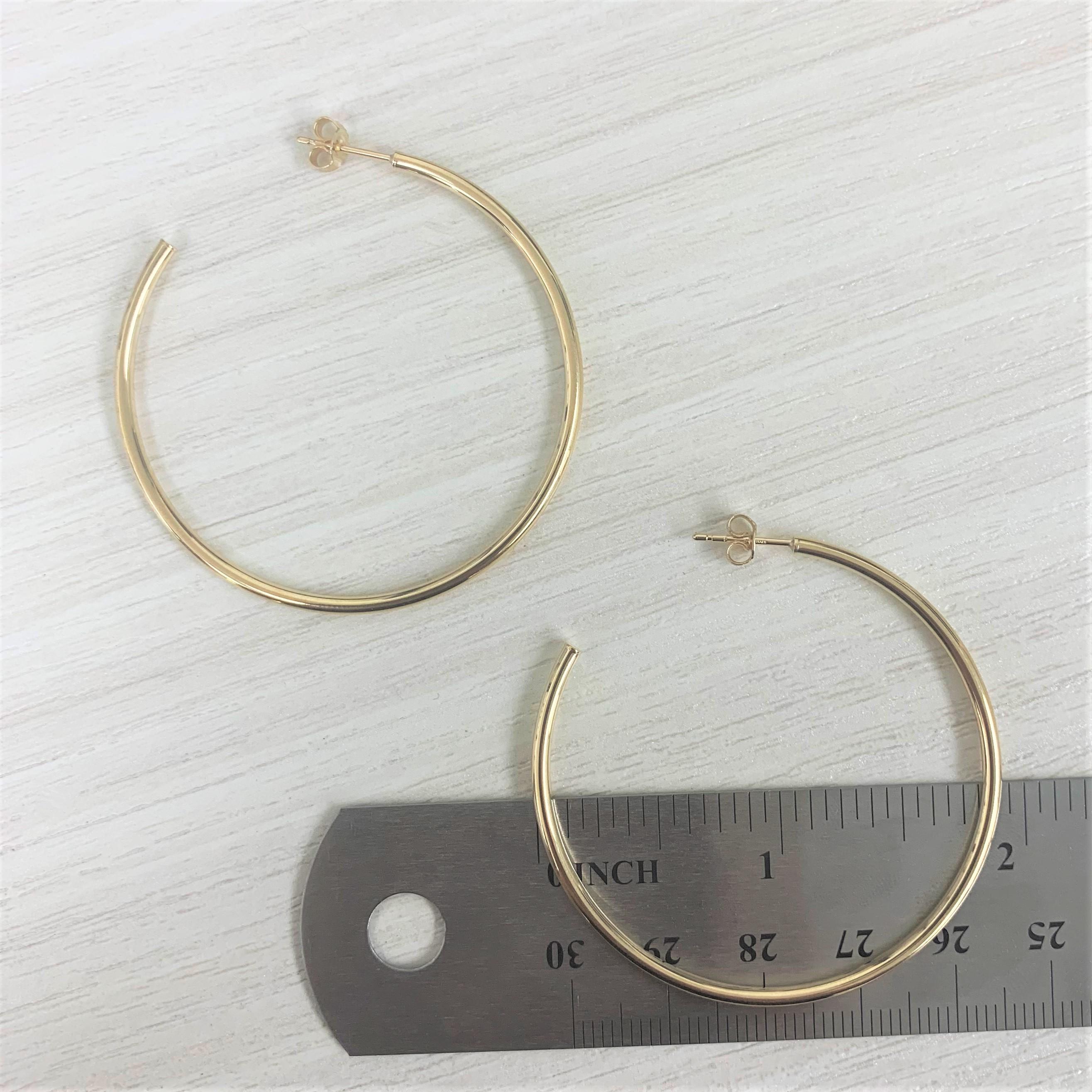Contemporary 14 Karat Yellow Gold Hoop Earrings For Sale