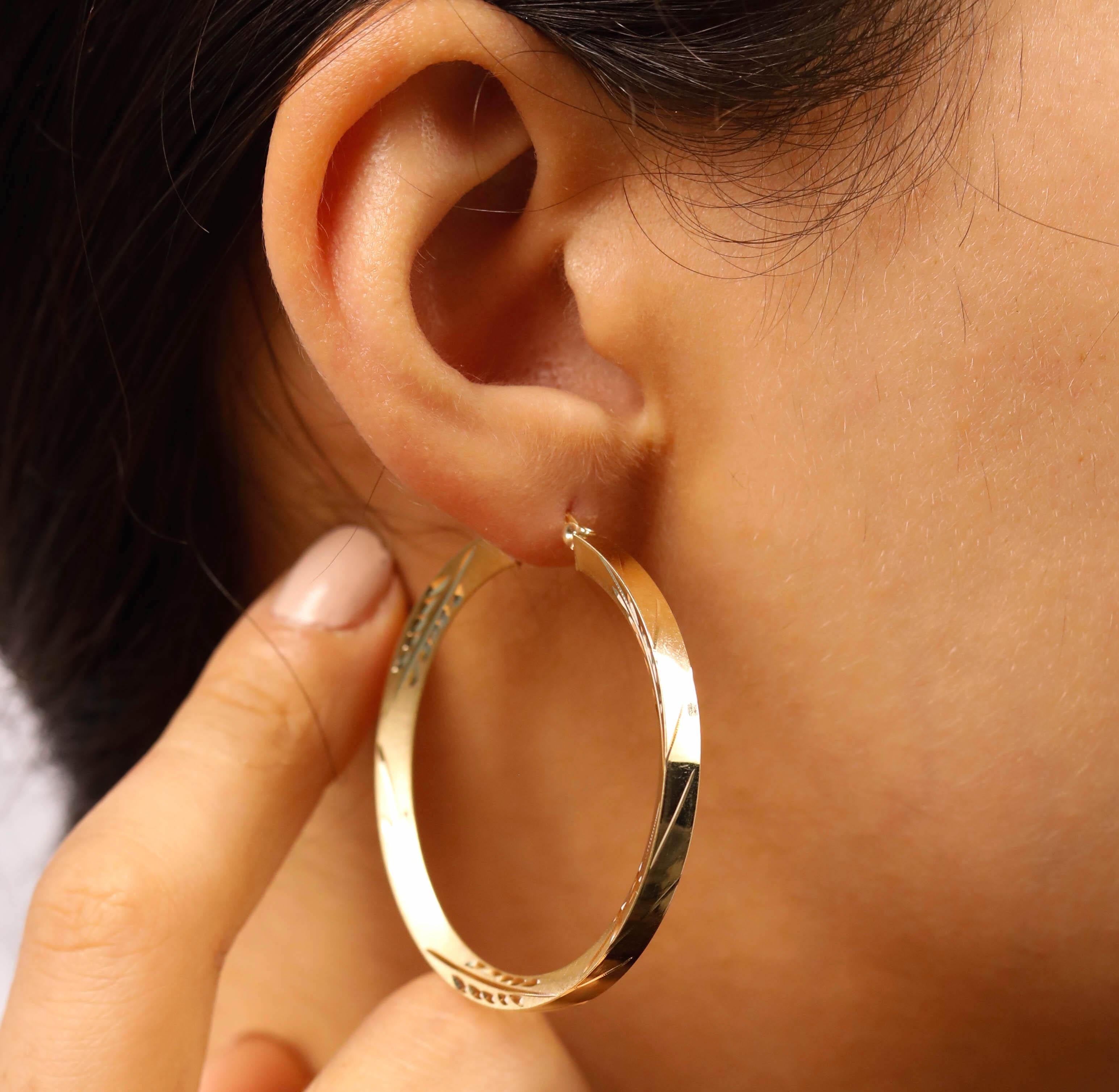 14 Kt Yellow Gold Hoop Earrings with Etched Design

These delicate hoop earrings are crafted in solid 14 karat yellow gold. Modeled after traditional jewelry, these hoop earrings are with Etched Design take on the classic gold hoop.

Metal Color: