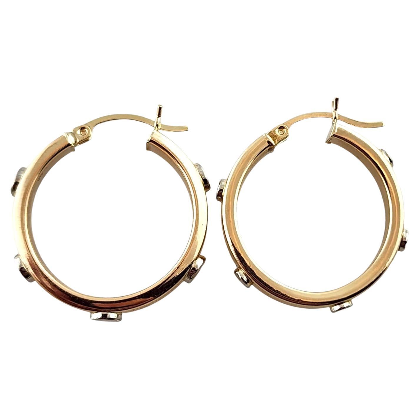 14 Karat Yellow Gold Hoops with White Gold Screws

These beautiful 14K yellow gold circle hoop earrings are decorated with 14K white gold screws!

Diameter: 23.2mm
Width: 4.35mm

Weight: 3.55 g/ 2.28 dwt

Hallmark: AS 14K

Very good condition,