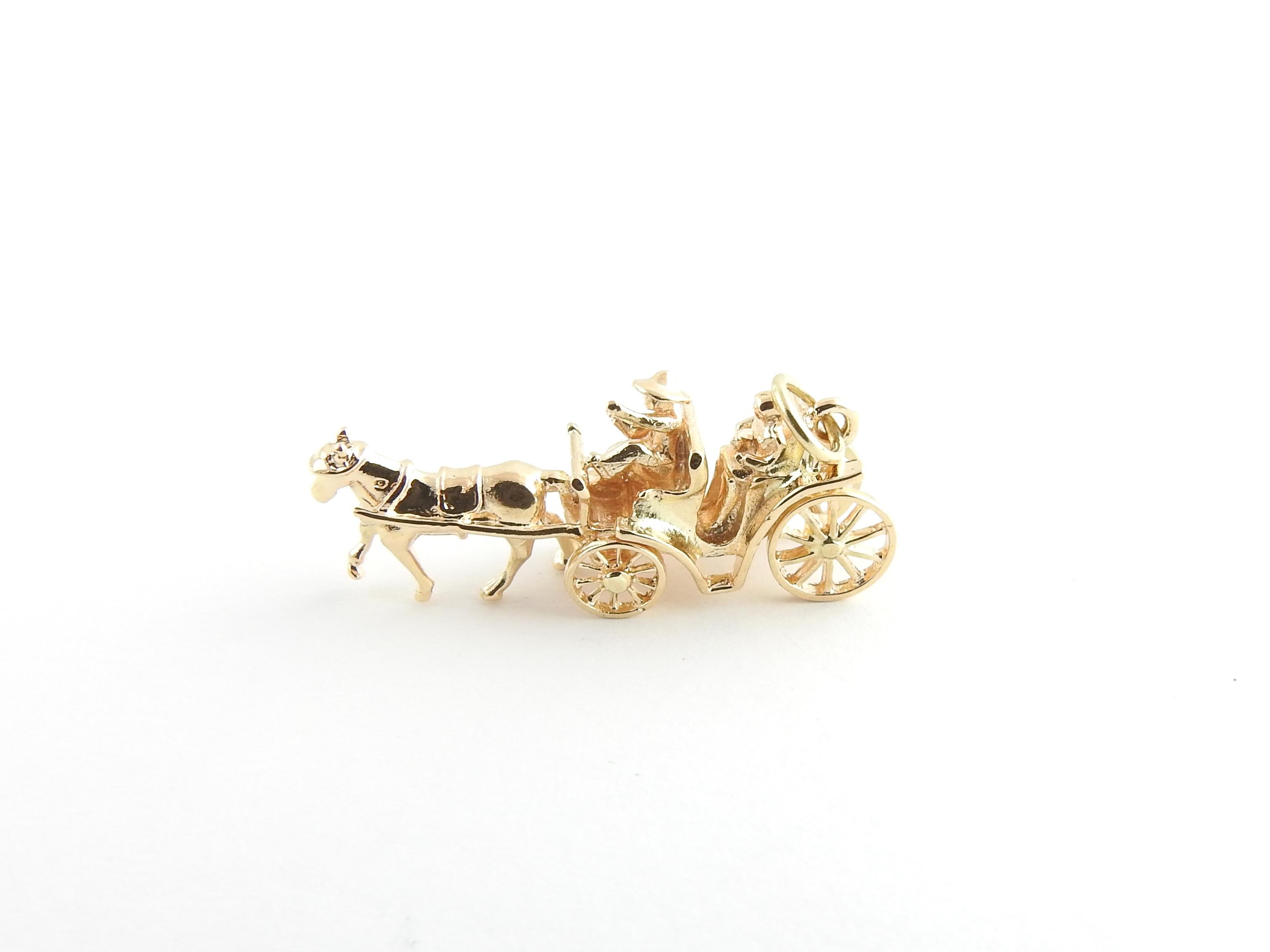 Vintage 14 Karat Yellow Gold Horse and Carriage Charm

This 3D charm features a moving wheels and plenty of detail! The horse and driver carry their passenger in a beautifully detailed carriage. Crafted in classic 14K yellow gold.

Size: 30 mm x 12