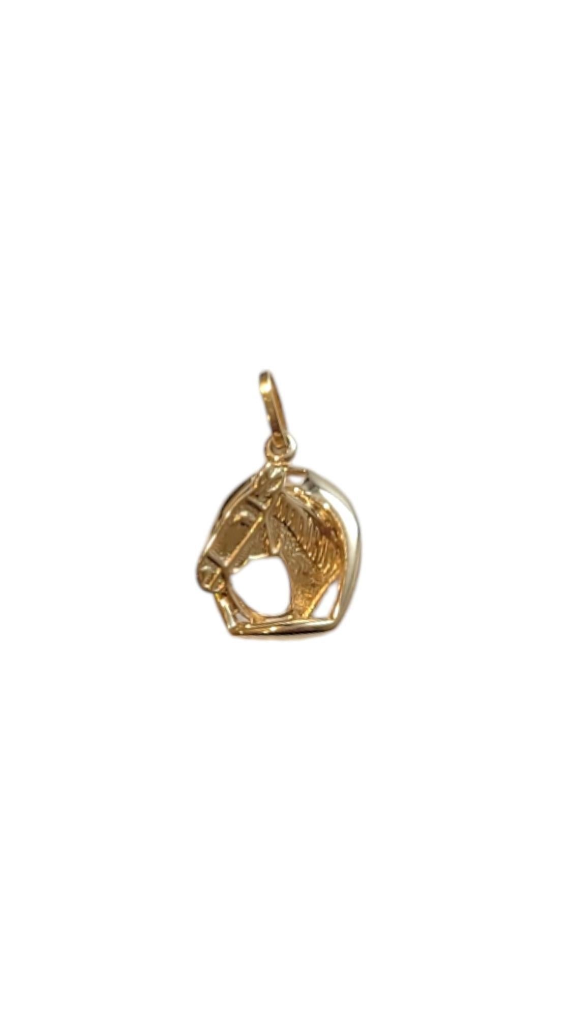 14 Karat Yellow Gold Horseshoe/ Horse Pendant

This 14K yellow gold pendant combines a lucky horseshoe with a beautifully detailed horse head. Perfect for equestrian enthusiasts and charm lovers alike!

Size: 19.99 mm X 11.19 mm X 4.1 mm

Weight: