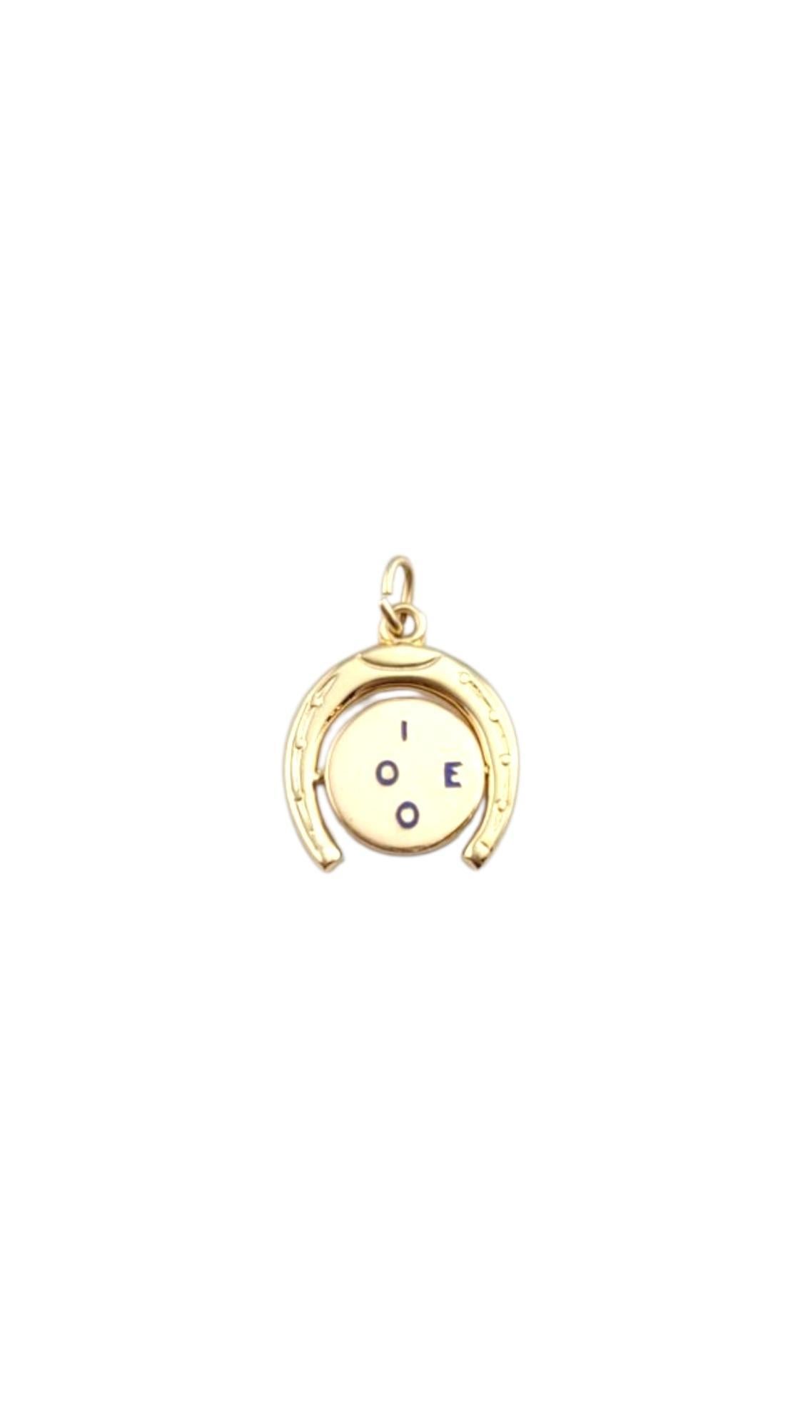 Amuleto giratorio "Te quiero" de oro amarillo de 14 quilates #22254 en venta