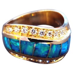 14 Karat Yellow Gold Inlaid Dublet Opal Ring It Consists of 7 Square Opals Lined