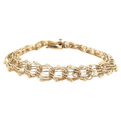 14 Karat Yellow Gold Interwoven Link Classic Charm Bracelet