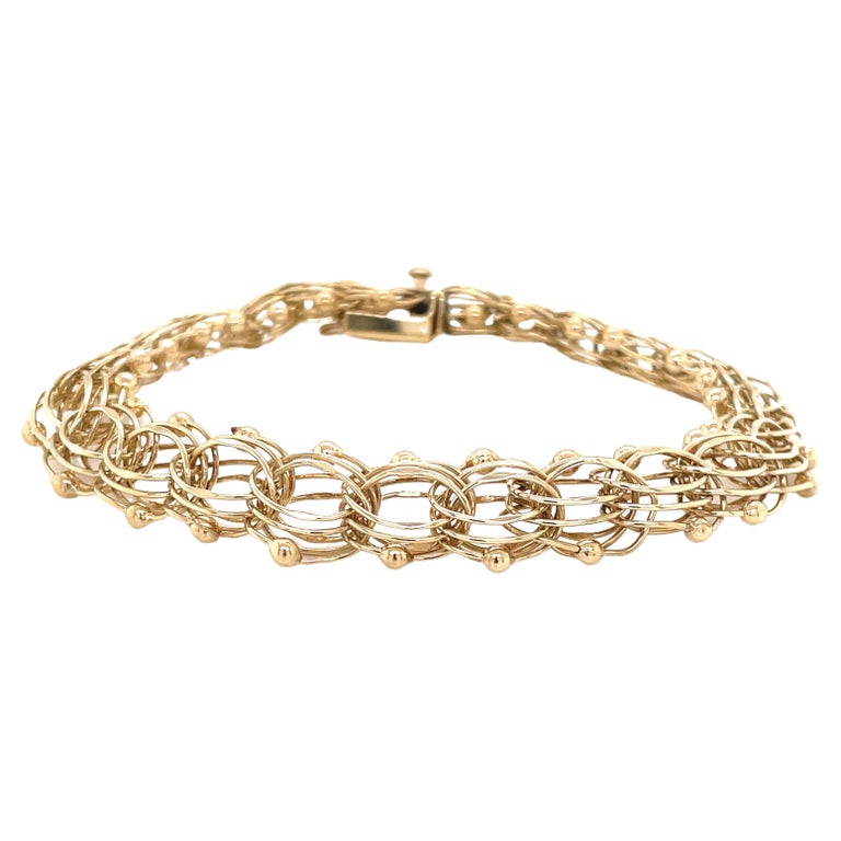 14 Karat Yellow Gold Interwoven Link Classic Charm Bracelet at 1stDibs