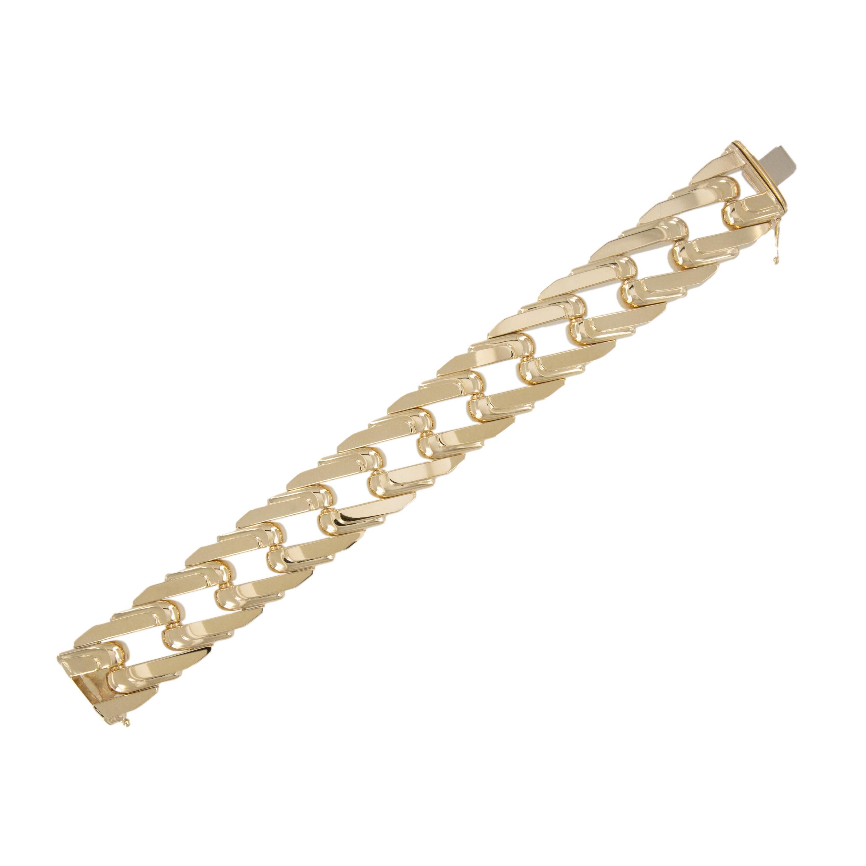 Bold is back! This eye-catching, heavy, Italian 14 karat yellow gold wide bracelet stands out with its' mirror effect Cuban links! New Old Stock!
Has a real presence on the wrist while feeling comfortable too. Bracelet is 7.75