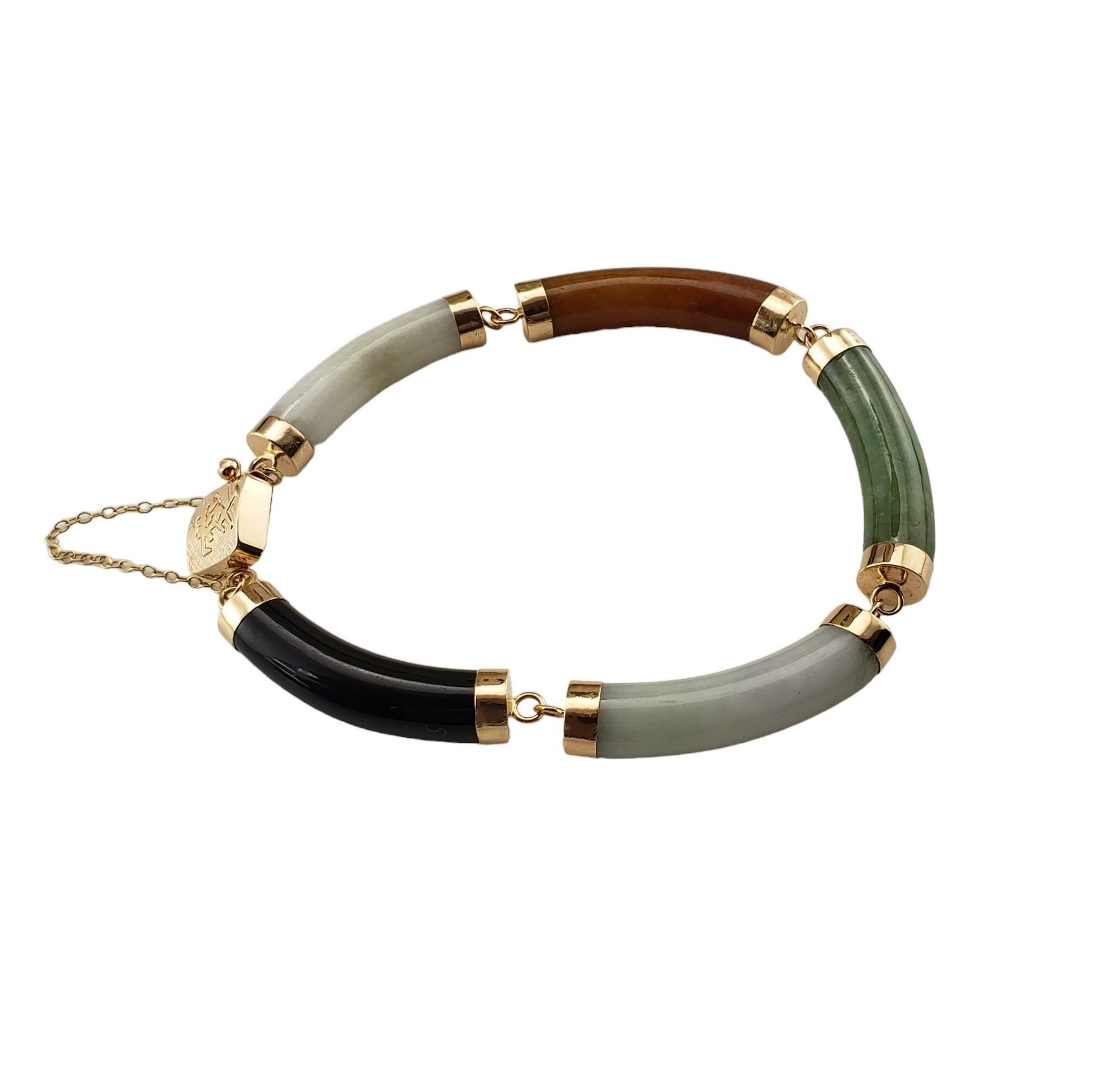 Vintage 14 Karat Gelbgold Jade-Armband-

Dieses elegante Armband besteht aus fünf mehrfarbigen Jadesteinen, die in klassisches 14-karätiges Gelbgold gefasst sind.  Breite: 6 mm.

Größe: 7 Zoll

Gestempelt: 14K

Gewicht: 20,1 gr./ 12,9 dwt.

Sehr