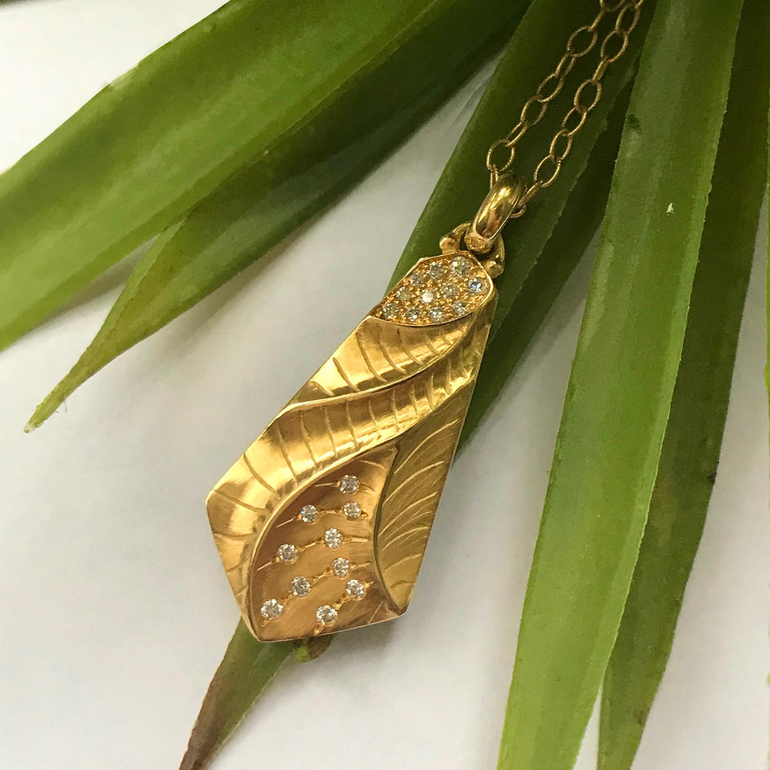 K. Mita's 14 Karat Yellow Gold Kite Pendant is accented with 0.25 Carats Diamonds (total weight). Handmade by the artist, the contemporary pendant from her Sand Dune Collection is 40 mm long and 17 mm wide18K yellow gold chain is 16